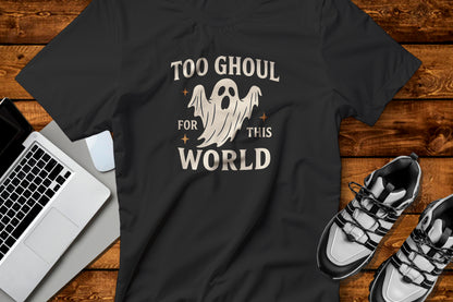 Black t-shirt with ghost graphic Too Ghoul For This World on a wooden surface featuring a laptop and shoes. for Halloween Gifts